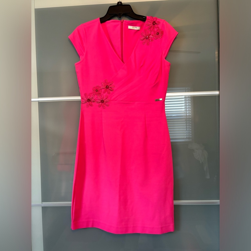 Women’s dress. Flowers applique.